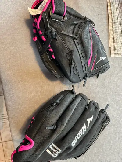 I'm offering a pair of children's baseball gloves, perfect for young players just starting out! Thes...