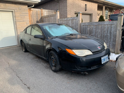 Saturn Ion with 'suicide' half doors for sale, best offer