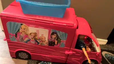 Barbie Camper Playset and Barbie Airplane Playset. Includes Barbie motorbike, dog, 7 Barbie’s and ev...