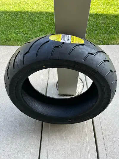 I am offering a new Dunlop American Elite rear motorcycle tire, size 200/55R17 M/C 78V, designed for...