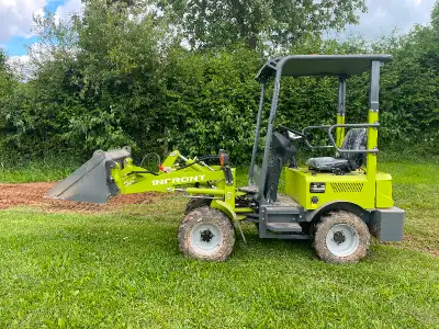 Infront electric wheel loader; only 46” wide and approx 10’6” long with bucket attachment. Joystick...