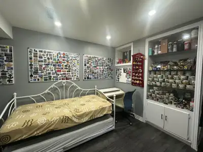 Basement Room Furnished with sofa bed that can fit 2 people Study table with chair Cabinet for cloth...