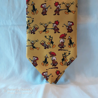Vintage 90s from the Tie Rack. Stored rolled or hanging, not knotted. No smoke, no pets, no alcohol...