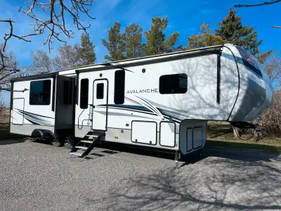 Purchased brand new from dealer in 2024. Used for two weeks last year. Upgraded receiver hitch and w...