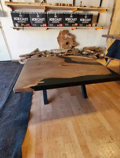 Handmade, brand new, Canadian black walnut coffee table with black epoxy resin river on metal powder...