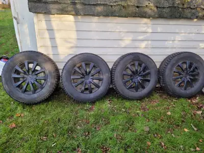 Bridgestone Blizzak 4 winter tires on rims for sale. Used one season. Bolt pattern is 5 x 120 mm. 23...