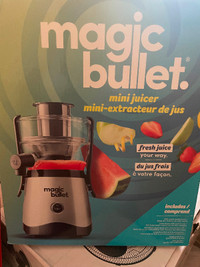 Brand new unopened magic bullet juicer !