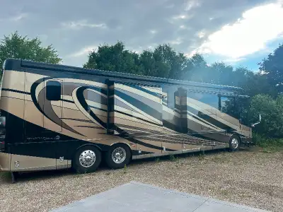 This luxury motor coach is one of the top of the line from Newmar. Complete with everything and anyt...