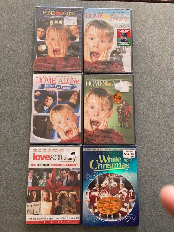new sealed Christmas DVDs Home Alone Love Actually White  in CDs, DVDs & Blu-ray in La Ronge