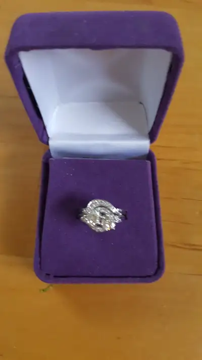 Stunning ring and one of a kind. Professional appraisal has been recently done. Asking $3000. or bes...