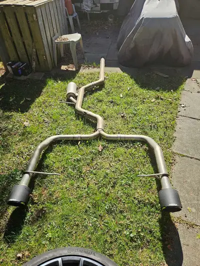 MBRP cat back exhaust with carbon tips for 2022+ VW GLI. Car was recently written off, no damage. $1...