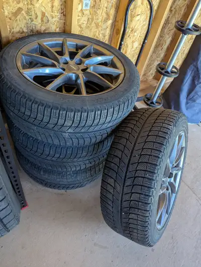 4 Michelin winter tires 245/45R18 on aluminum rims. All in good condition. Bolt pattern 5 X 144.3, o...
