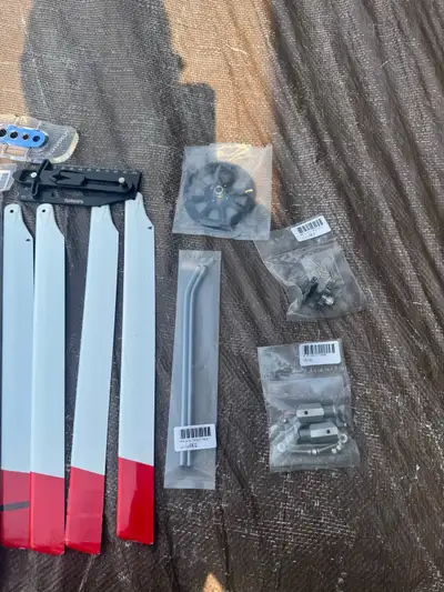 Box of r/c helicopter parts , to much to list individually. Buddy gave them to me to sell. He bought...