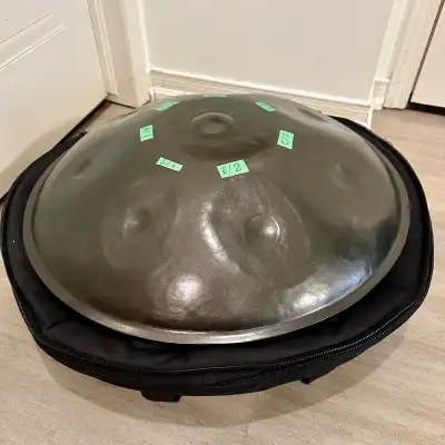 Selling a used 23" Handpan I believe its a D minor Comes with a padded carrying case which also doub...