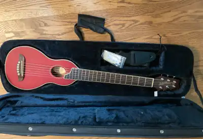 Beautiful Washburn Travel guitar with a wonderful red finish, hasn’t been played nearly at all, was...