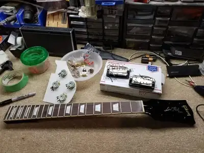 Guitar setups, upgrades, restoration and custom builds, View more