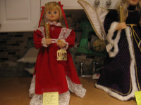 CHRISTMAS DOLL MOVES AND LIGHTS -PLUG IN.