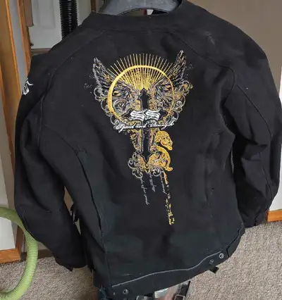 This is a Speed Strength Ladies Motorcycle Jacket, perfect for any rider looking for style and prote...