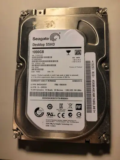 Model: ST1000DX001 7200RPM Includes 8GB SSD for fast access. Only used for 4 months.