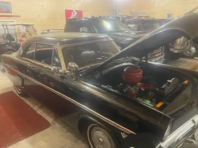 Own a piece of automotive history with this striking 1954 Ford Victoria coupe, boasting a robust V8...