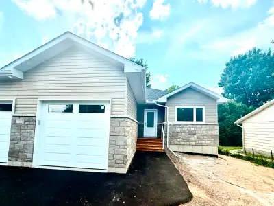 Enjoy upscale living in this beautifully designed 4-bedroom duplex located in a serene neighbourhood...