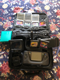 Sega Game Gear with accessories and games 