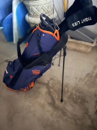 Brand new golf bag and 2 clubs, View more