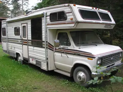 460 cu inch gas engine. Runs well. Canopy, new HWT, rear bedroom, shower, sink, toilet, refrigerator...