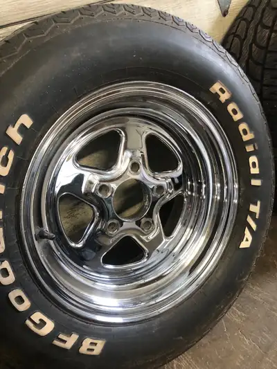 Old hot rod rims and tires. 15x8. Rears are 255/60R15 Hercules tires still good. Fronts are 235/60R1...