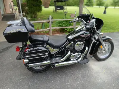 Nice cruiser, lots of additions to stock, very good condition with fairing, side bags and rear trunk...