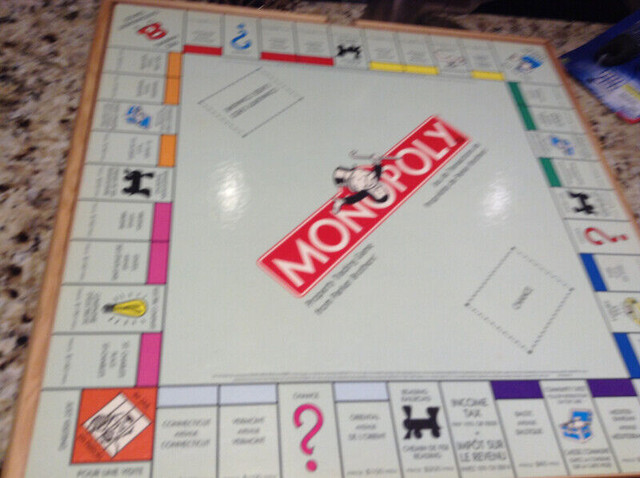 Wooden box style Monopoly and CLue games for sale in Toys & Games in London
