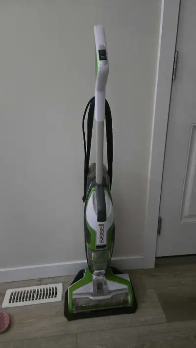 This Bissell Crosswave multi-surface floor cleaner is a pre-owned cleaning essential that effectivel...