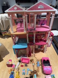 Barbie dream house plus dolls, furniture and car