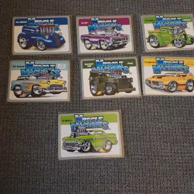 Selling a set of Muscle Machines trading cards featuring vibrant graphics of classic cars like the '...