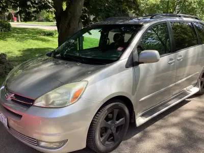 2005 Toyota Sienna, new Michelin tires, wheels, exhaust, a/c in/op. No accidents