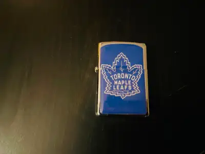 MOVING SALE!!! 10 OBO Selling my Toronto Maple Leafs Lighter. It is a Zippo Style (Cheaper no name v...