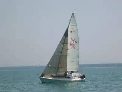 primarily a racer, PHRF rating 126, has 6 berths, galley with 2 burner stove and ice box, sink. head...