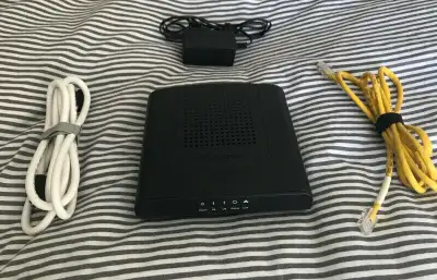 Thomson DCM476 Cable Modem w/ Cables + AC Adapter Teksavvy For use with Third Party Internet Service...