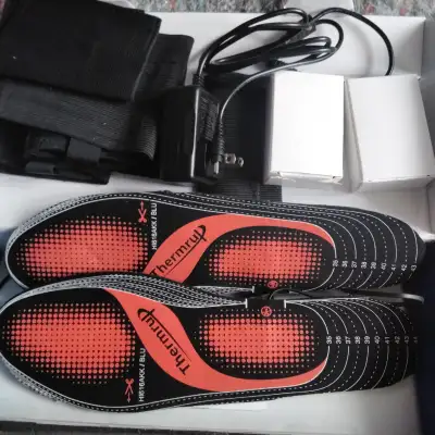 HEATED INSOLES NEW RETAILS FOR $100 WITH TAXES ADJUSTABLE SIZE, View more