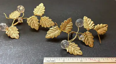 2-beautiful Crystal ornaments with gold leaflets for sale. Made in Italy. Front porch pick up from a...