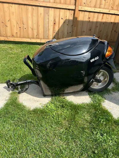 Uni-go 1 wheel trailer, has been used for about 1000 Km, hitch receiver included, 1 spare wheel bear...