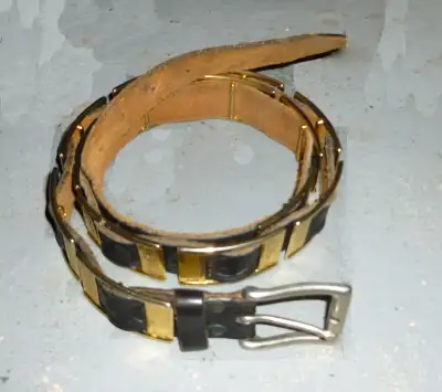 About a size 36-38 waist but could fit smaller by punching holes. Has brass buckles throughout the l...