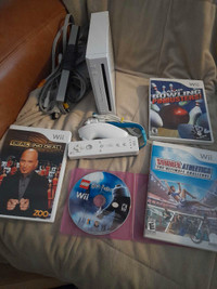 Nintendo Wii with 4 Games