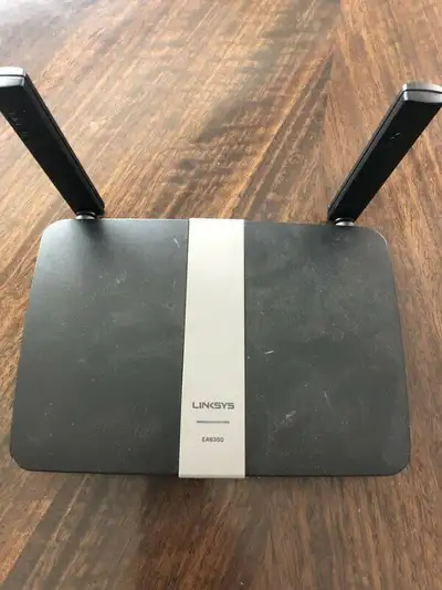 Linksys EA6350 AC1200+ Dual-Band Smart Wi-Fi Wireless Router Engineered for the well-connected house...