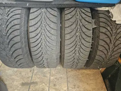 These are four winter snow tires with size 235/70R16, offering reliable traction and safety during t...