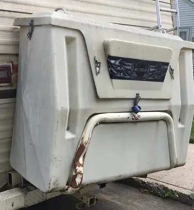 I had this on the back of my motorhome and it tucked away a lot of my outdoor stuff. $60.00 306-241-...