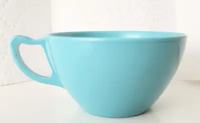 Vintage Melmac turquoise blue coffee cup. 1960s era. Made in Canada. This particular cup has an unus...