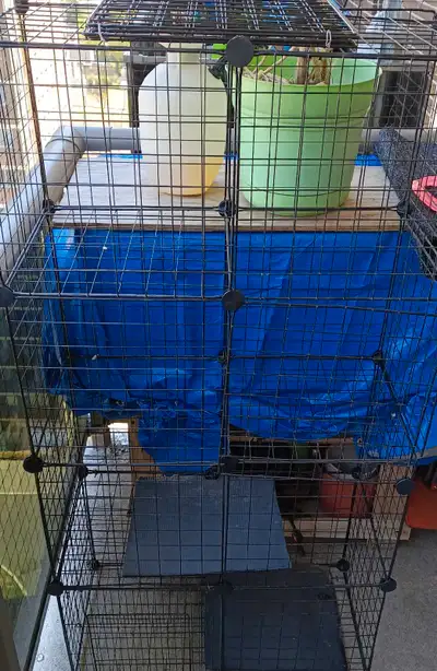29"x14"x56" Suitable for a small animal There's another couple of black floor panels that go with it...