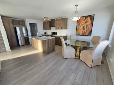 For rent a Beautiful sunny room in a 3 bedroom 3 bathroom corner house in Skyview Ranch NE Calgary....