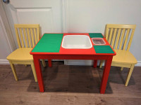 Lego table with two small chairs, all solid wood